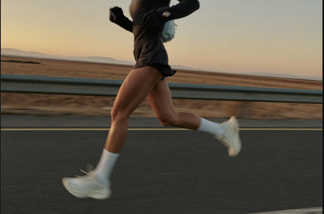 Marathon runner mid-stride on a road